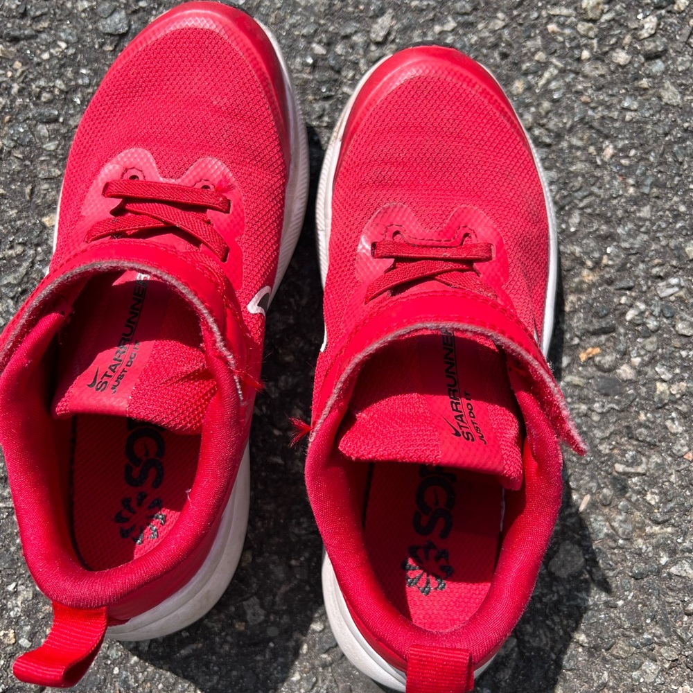 Nike size 13 boys sneakers, gently used but no tears.
